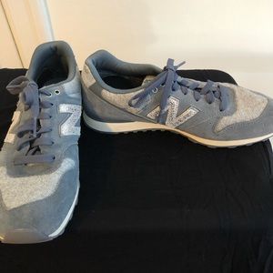 Silver and grey New Balance sneakers